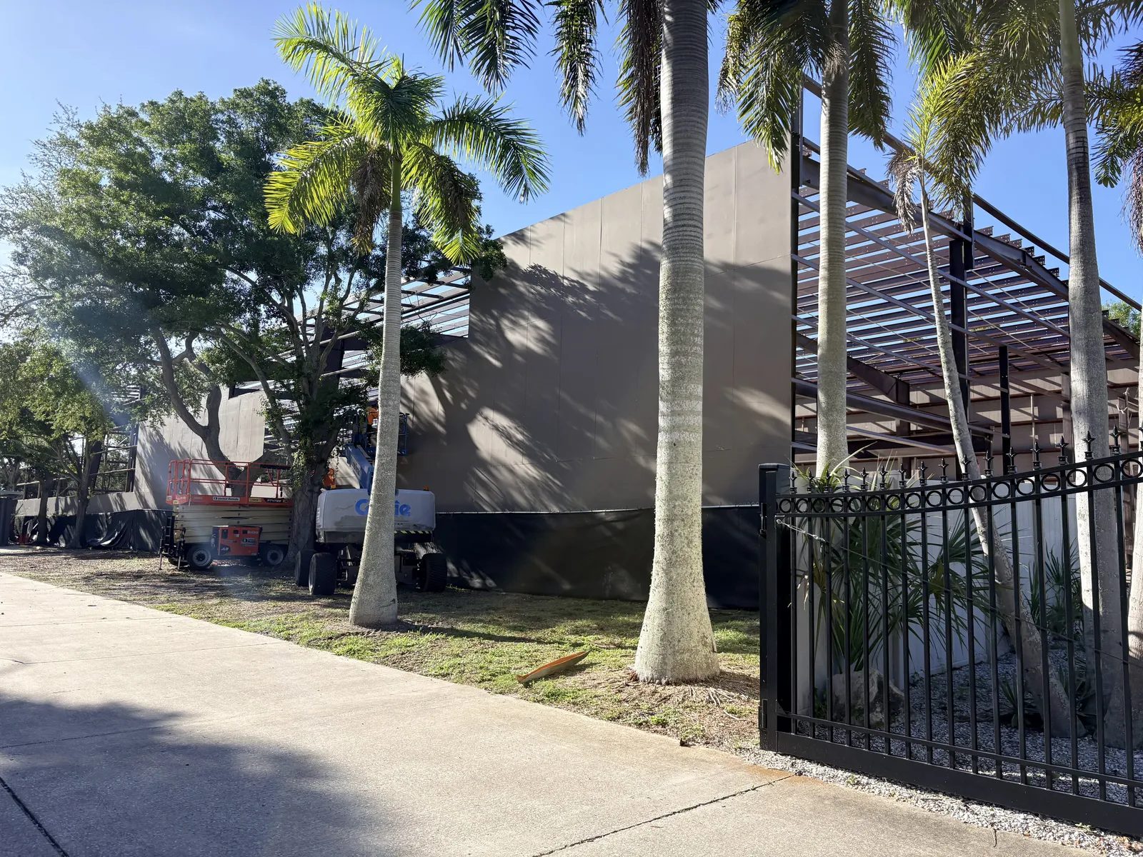 Exterior view of the Anvil Auto Vault facility with palm trees