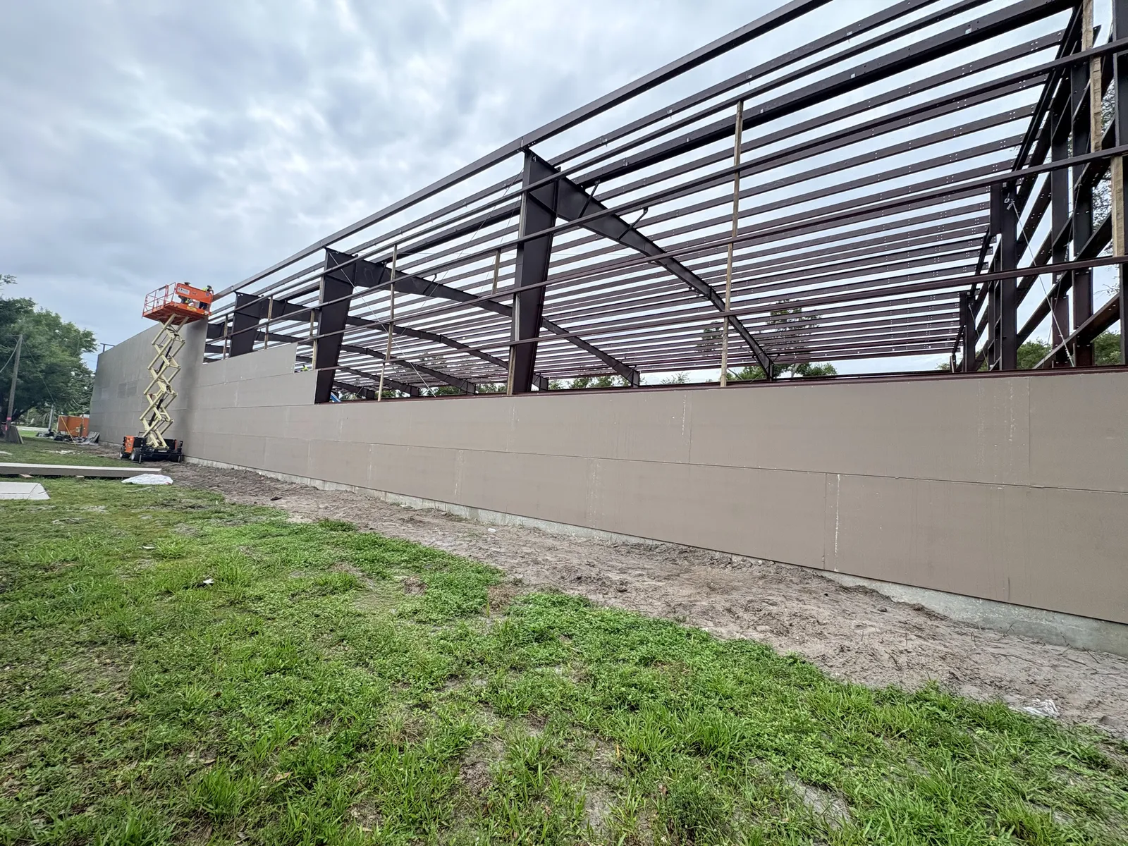 Anvil Auto Vault building with concrete walls, steel roof framing, and security gates